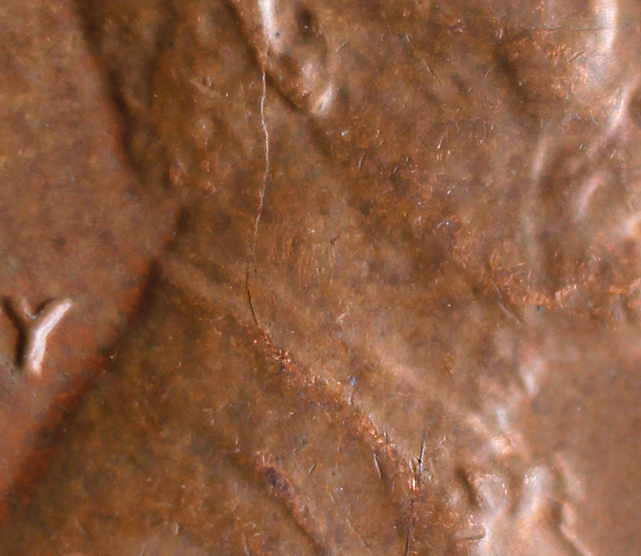 1973-D-LMC-Rim-To-Rim-Bi-Secting-Die-Crack